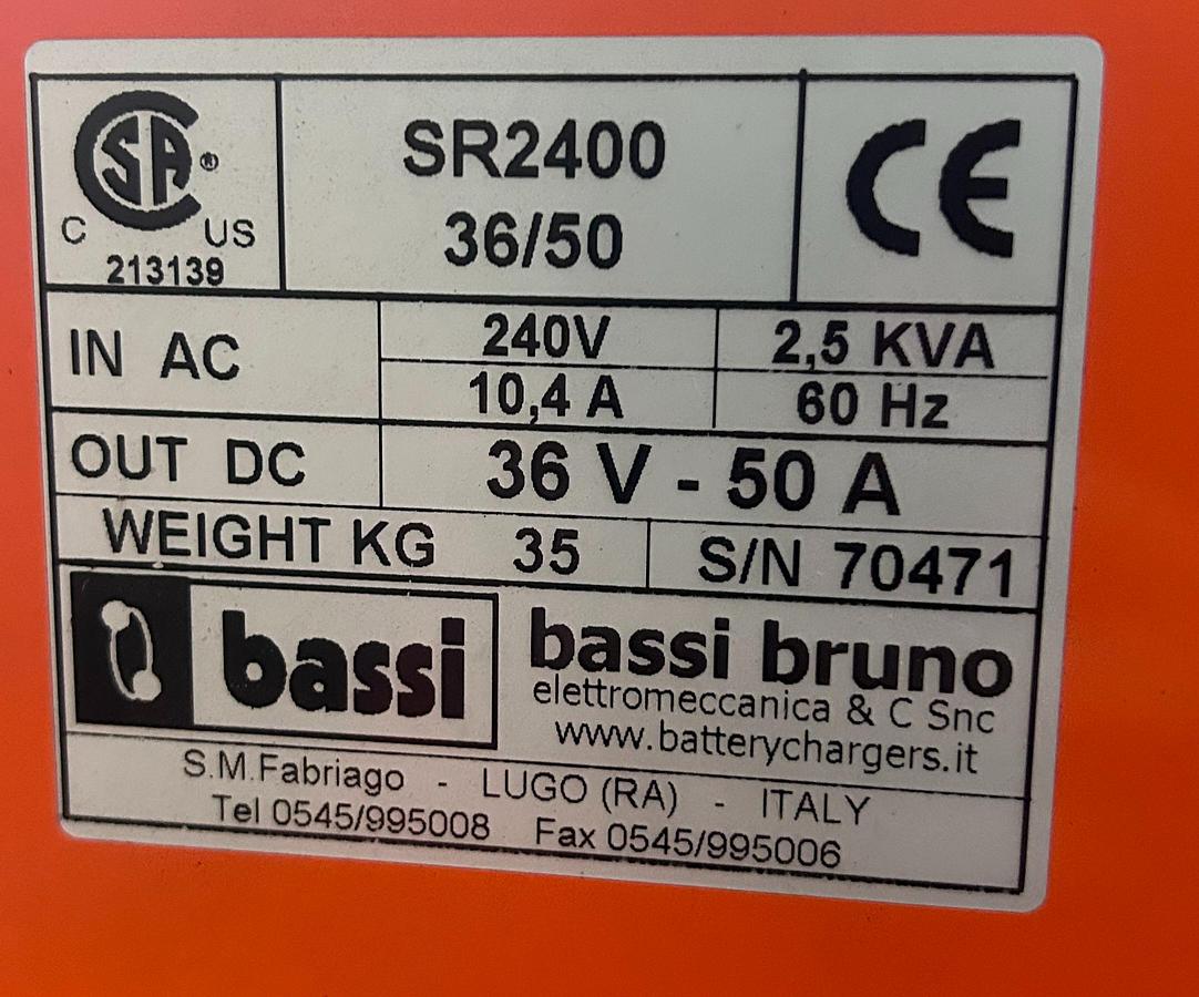“Bassi Bruno charger dataplate showing model SR2400, serial 70471, 36V 50A output, 18‑cell lead‑acid specs, and 240V single‑phase input.”