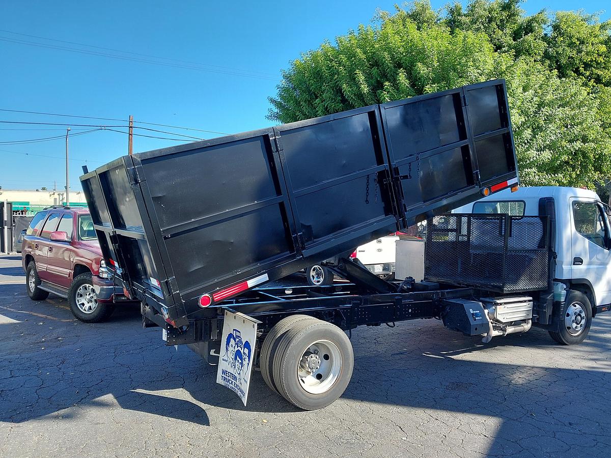 Used 2012 Fuso FE 180 Diesel with a 14' Stake Dump