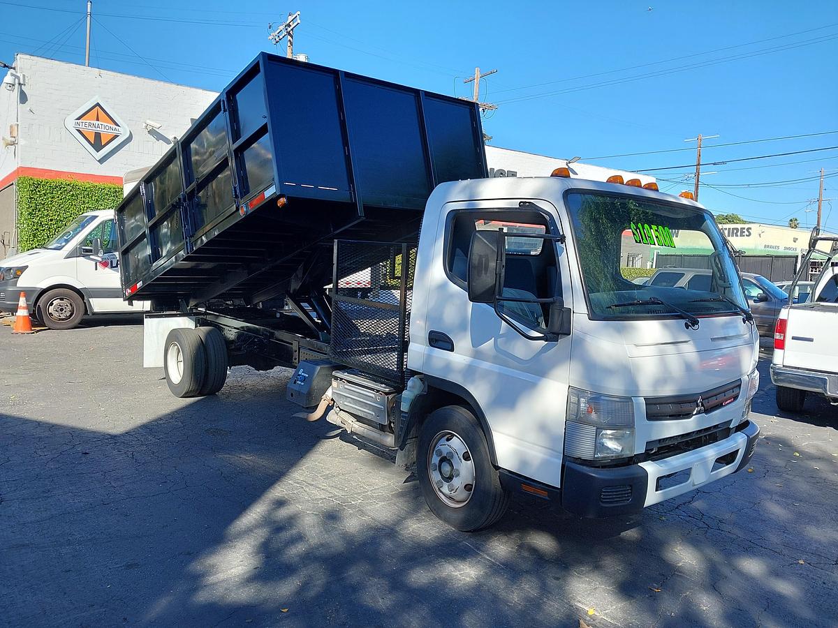 Used 2012 Fuso FE 180 Diesel with a 14' Stake Dump