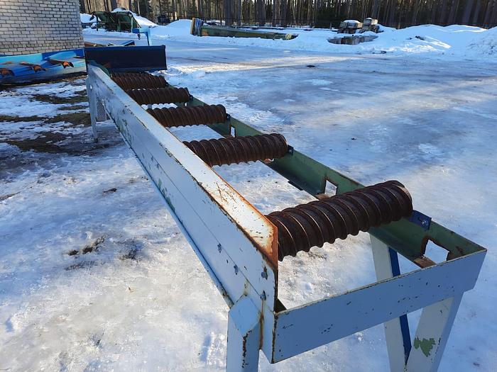 Used Screw type roller conveyor with side pusher