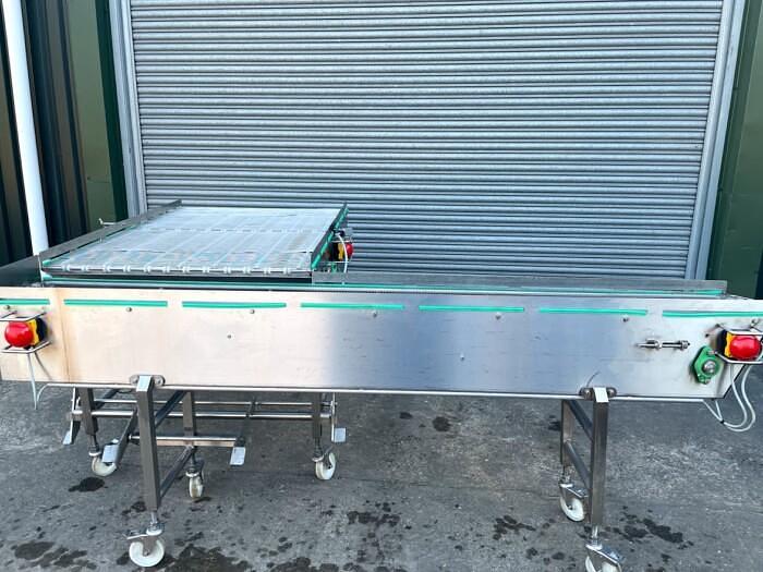 Used SPACING AND FILING CONVEYOR SYSTEM