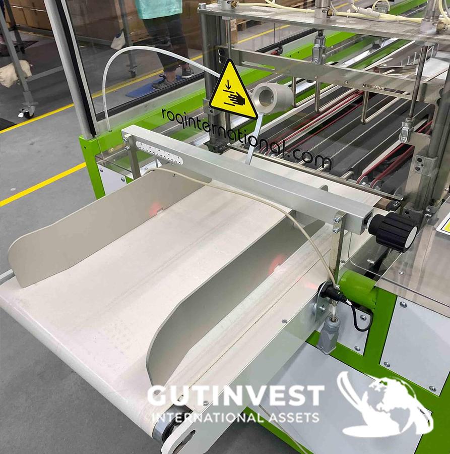Usado Máquina automática de doblado y embalaje de prendas