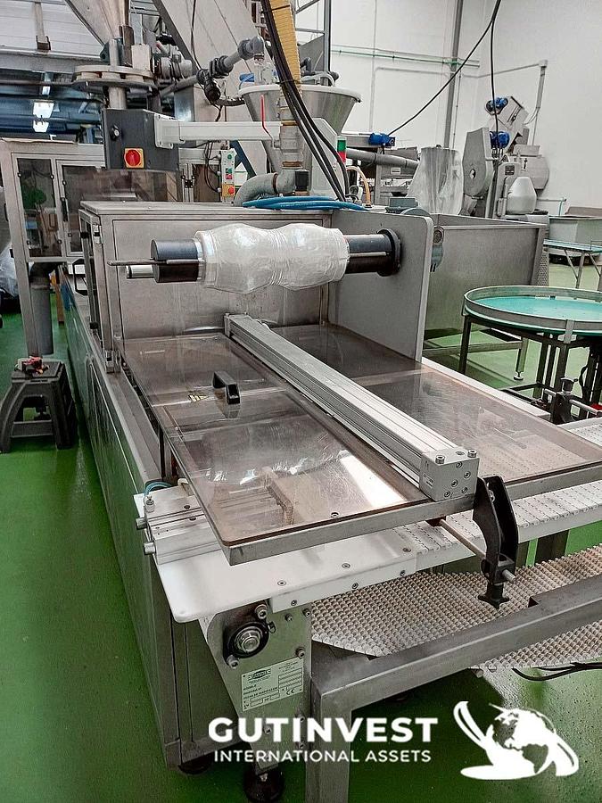 Usado Línea automática de Termosellado de envases de plástico