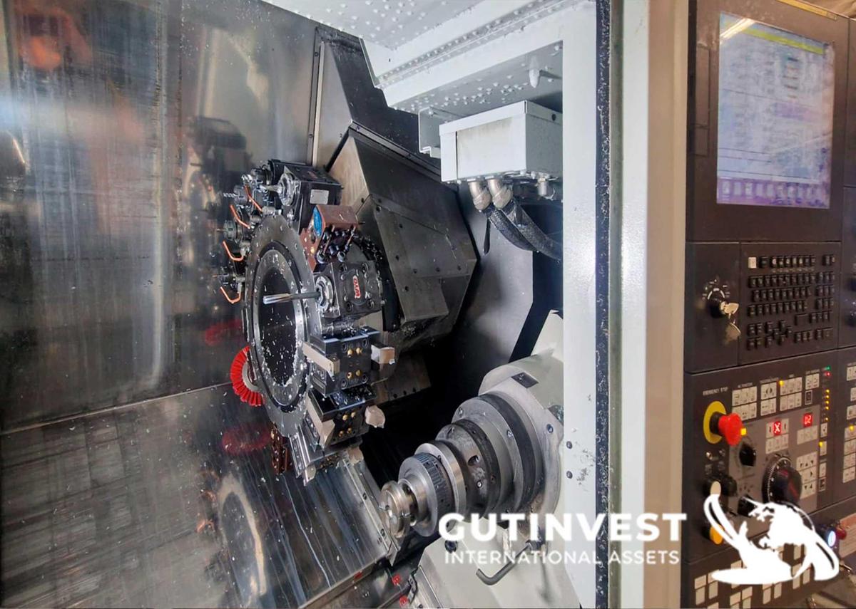 Used 4-Axis CNC Lathe with Robotic Arm