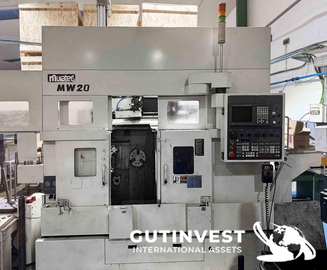 Usado Torno doble cabezal con robot gantry
