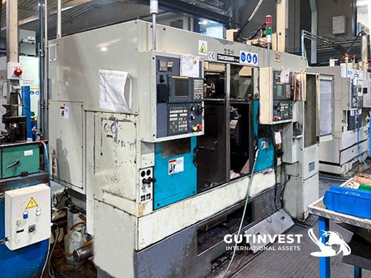 Usado 1 - Torno CNC - doble husillo y torreta