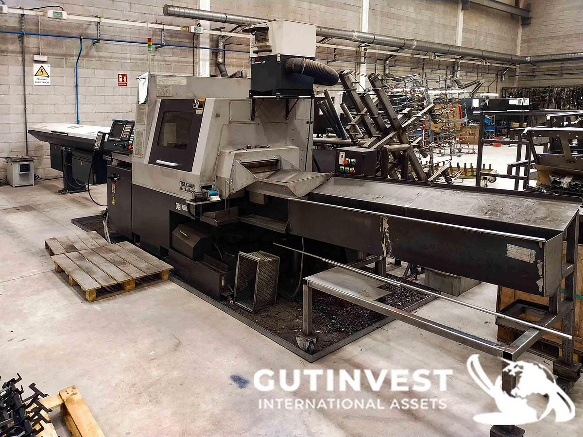 Usado 1 - Torno cnc con alimentador de barras