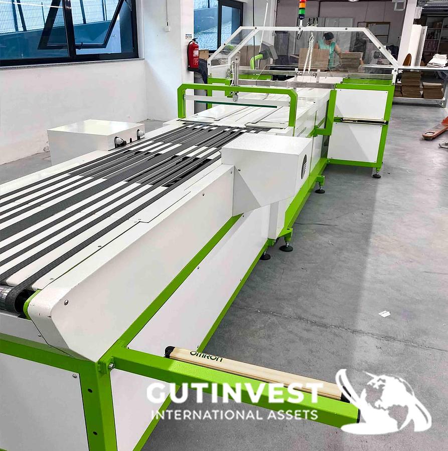 Used Automatic garment folding and packaging machine