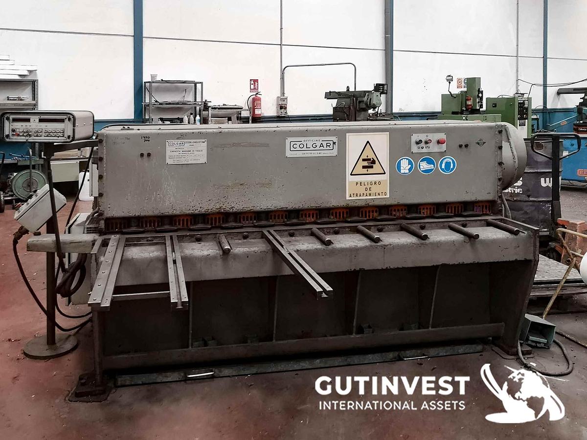 Used Shear press with automatic stacker