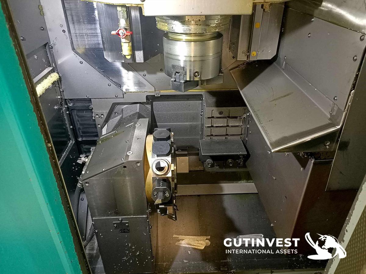 Used 1 - Double spindle CNC lathe