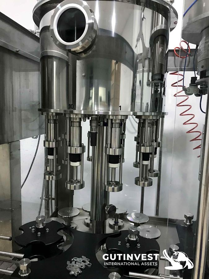Usado 1 - Llenadora taponadora monobloc - botellas de 0,33 y 0,5lts.