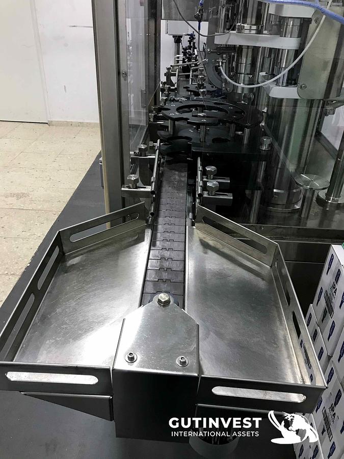 Usado 1 - Llenadora taponadora monobloc - botellas de 0,33 y 0,5lts.