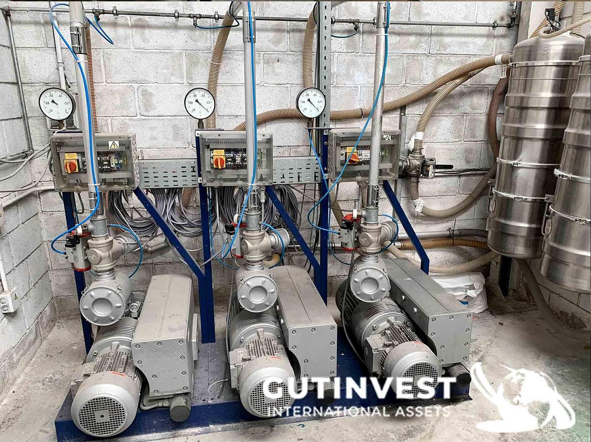 Usado 1 - Instalación alimentación material a inyectoras de plástico