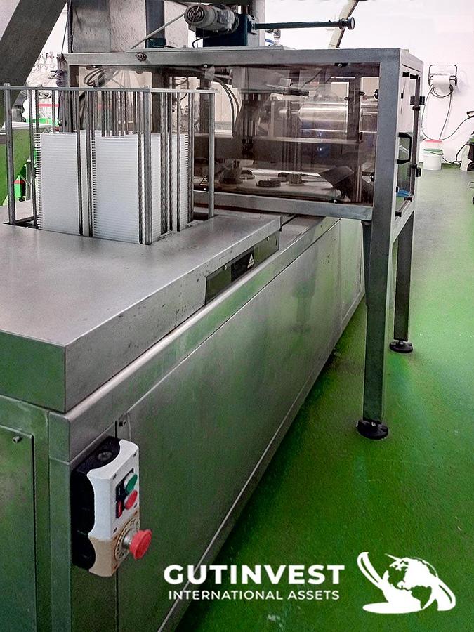 Usado Línea automática de Termosellado de envases de plástico