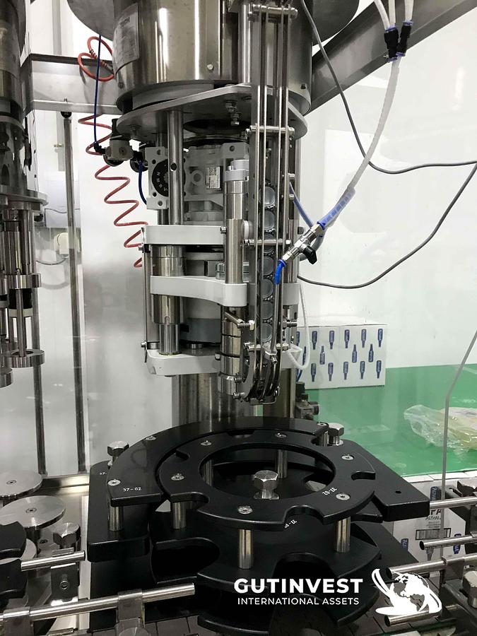 Usado 1 - Llenadora taponadora monobloc - botellas de 0,33 y 0,5lts.