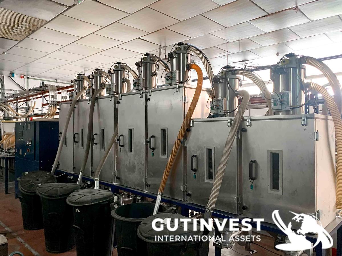 Usado 1 - Instalación alimentación material a inyectoras de plástico