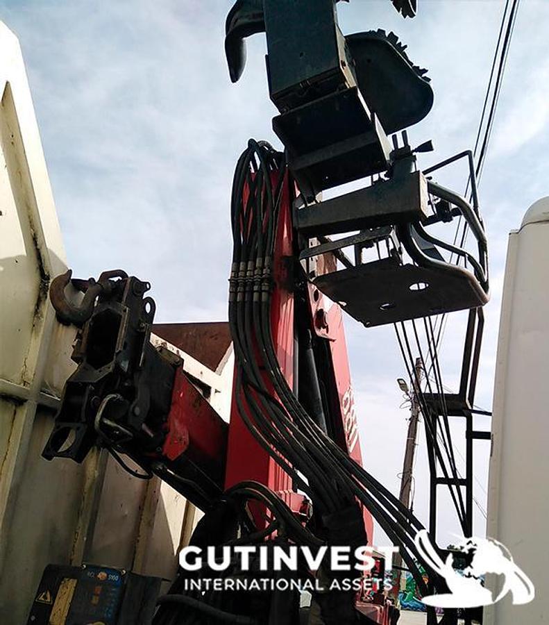 Usado Camión caja basculante con grúa