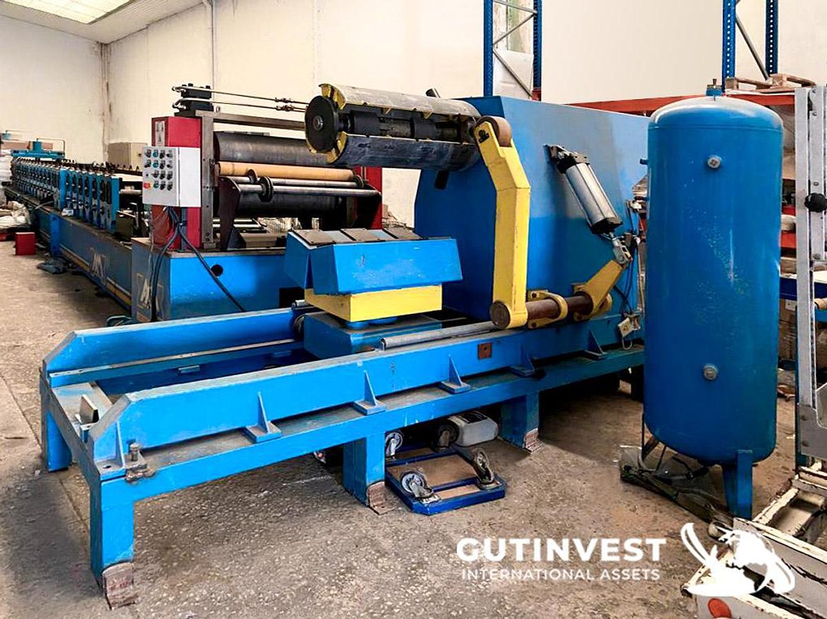 Used 1 - Sectional door rolling line - 24 heads