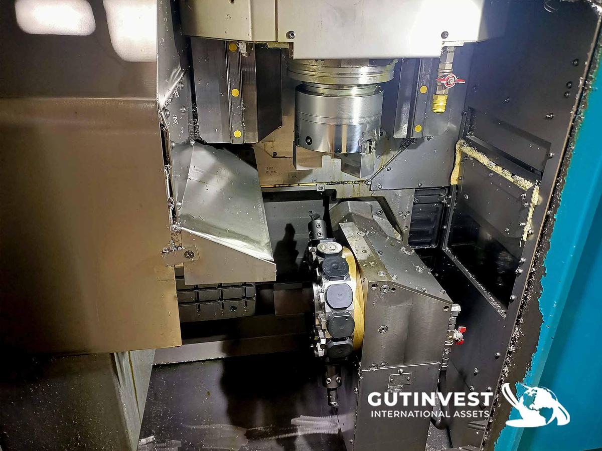 Used 1 - Double spindle CNC lathe