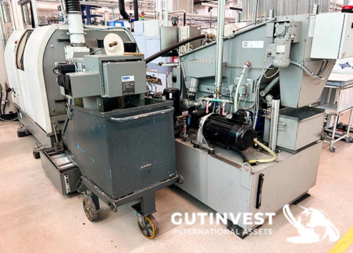 Usado Torno CNC de cabezal móvil con alimentador de barras