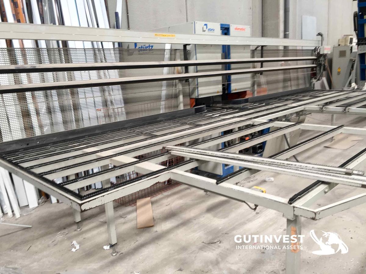 Usado 1 - Soldadura vertical CNC 4 brazos y limpiadora marcos Alu