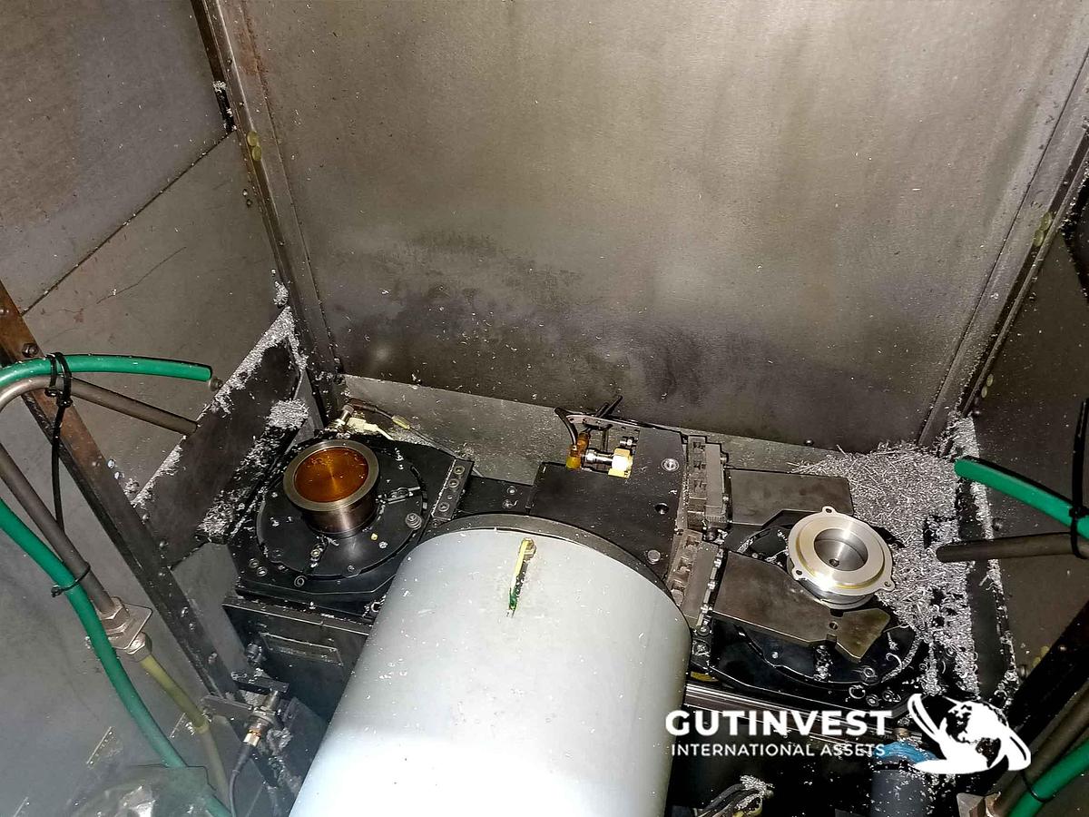 Used 1 - Double spindle CNC lathe