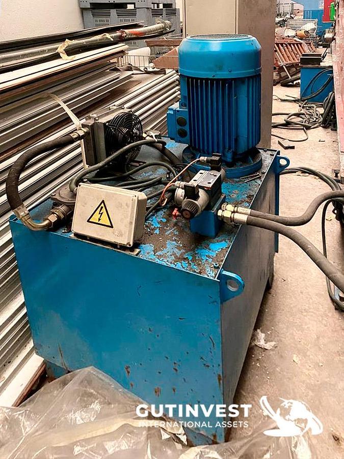Used 1 - Sectional door rolling line - 24 heads