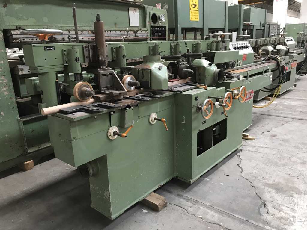 Usato Scorniciatrice marca Gubish attrezzata per pezzi tondi diam. 41mm (completa di utensili per altri diametri di pezzi tondi)