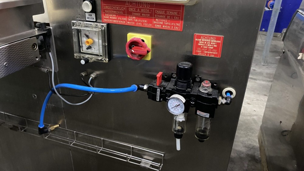 Used Webomatic vacuum line