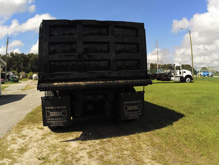 Used 2016 CATERPILLAR FACTORY DUMP TRUCK