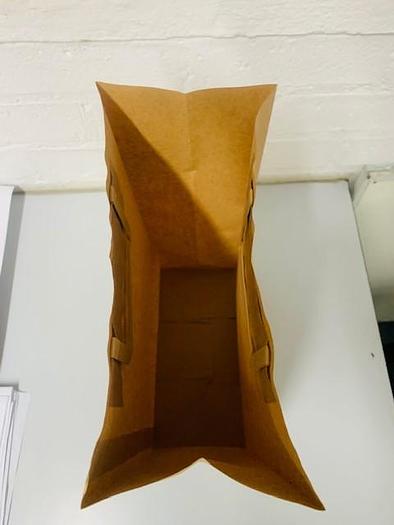 Used (visible in production) NEWLONG 117T+ 506TH - Reel Fed paper bag machine with Flat handles unit