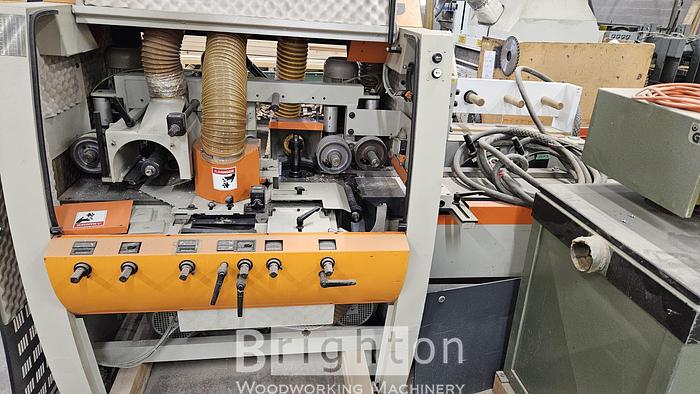 Used 2001 Weinig Quattro Q23P used 4 head moulder. #BM2702