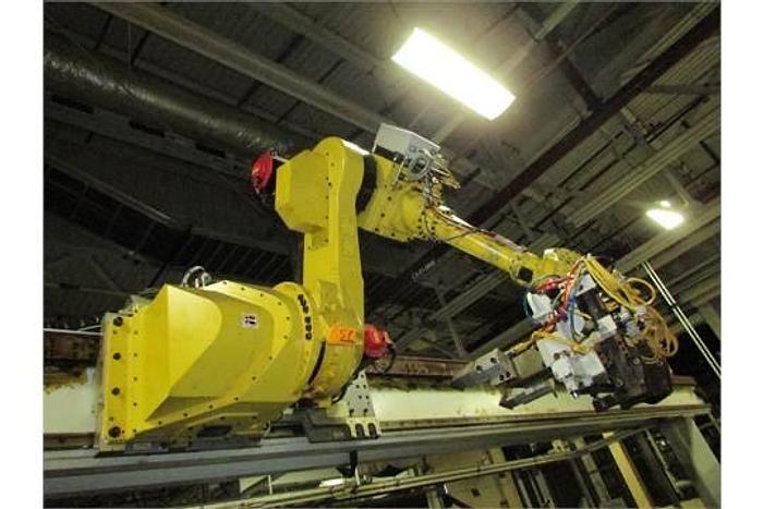 Used FANUC GANTRY ROBOT SYSTEM WITH M710iB/70T ROBOT 8' TALL X 10,200 MM TRAVEL RJ3iB CONTROLLER
