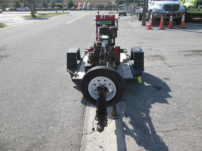 Used Barreto model 912 walk behind trencher and trailer