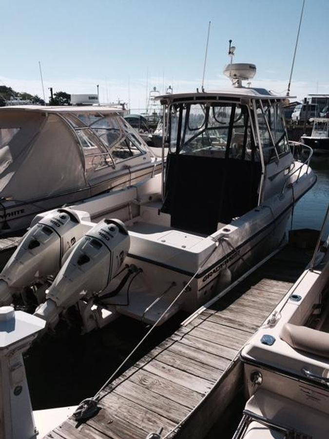 Used Grady White 232 GUlfstream with 2009 Evinrude E-Tec 150's