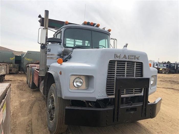 Used 1994 MACK RB 690S ROLL OFF TRUCK