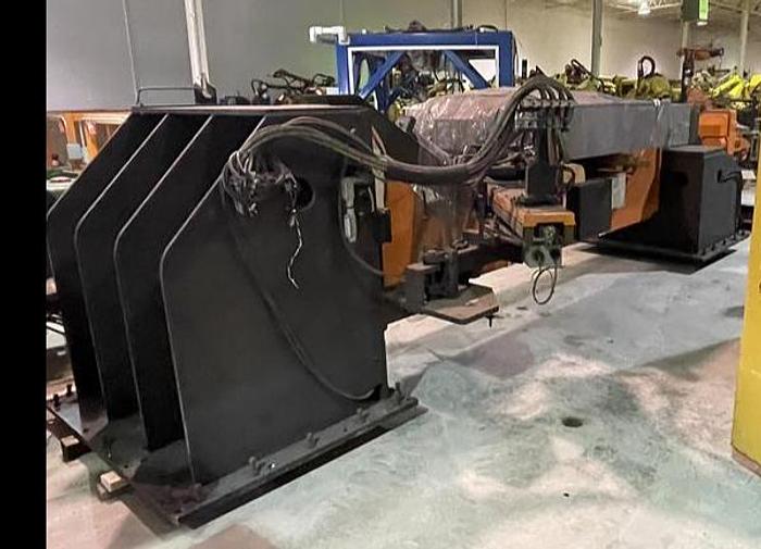 Used FANUC ARCMATE 120iC/10L MIG WELDING CELL WITH 2 AXIS 10' LONG DROP CENTER TRUNNION W/ROTARY CNC TABLE