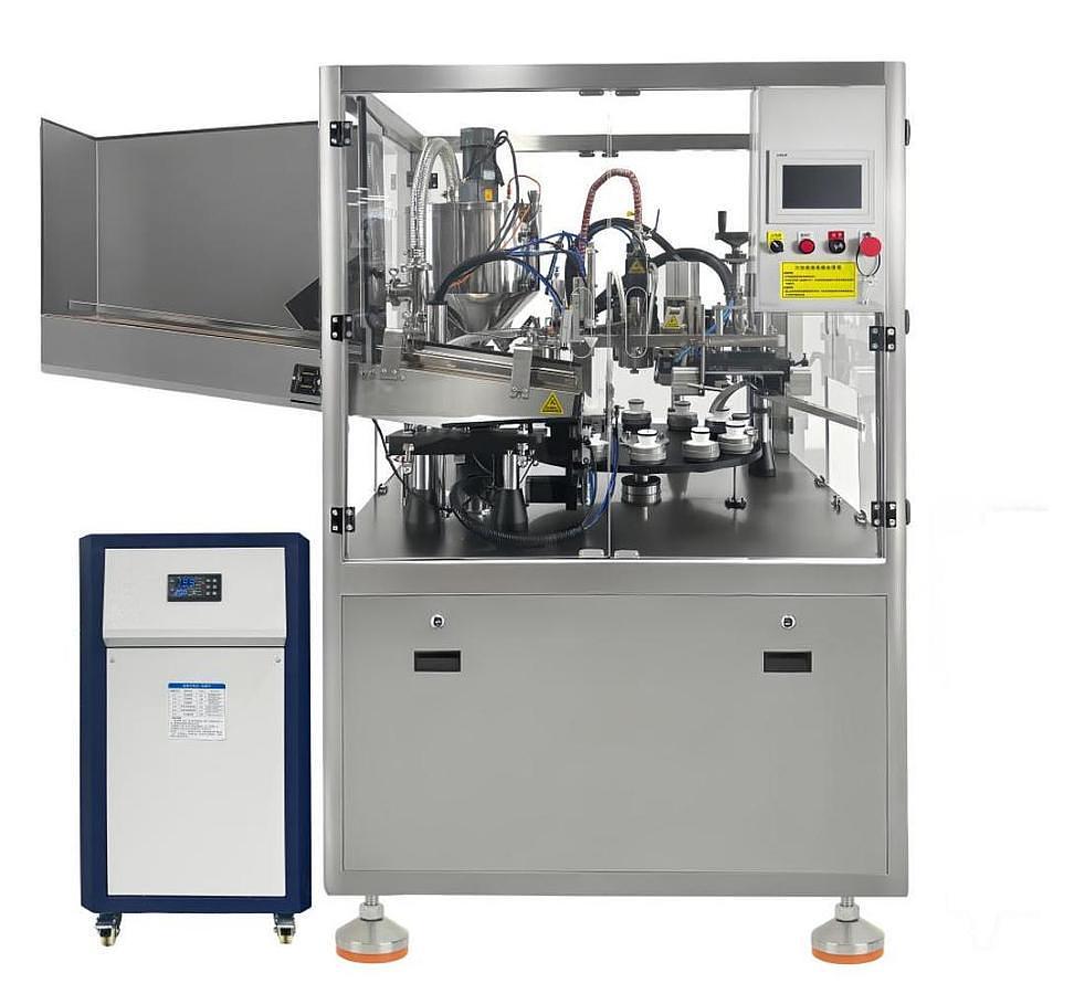 AUTOMATIC FILLING AND SEALING MACHINE (WITH INTERNAL HEATING)
