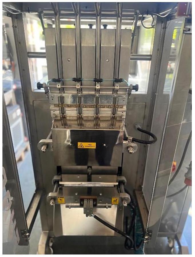 Used TURPACK 3 SIDE VERTICAL SEAL STICK PACK MACHINE - 4 LANE