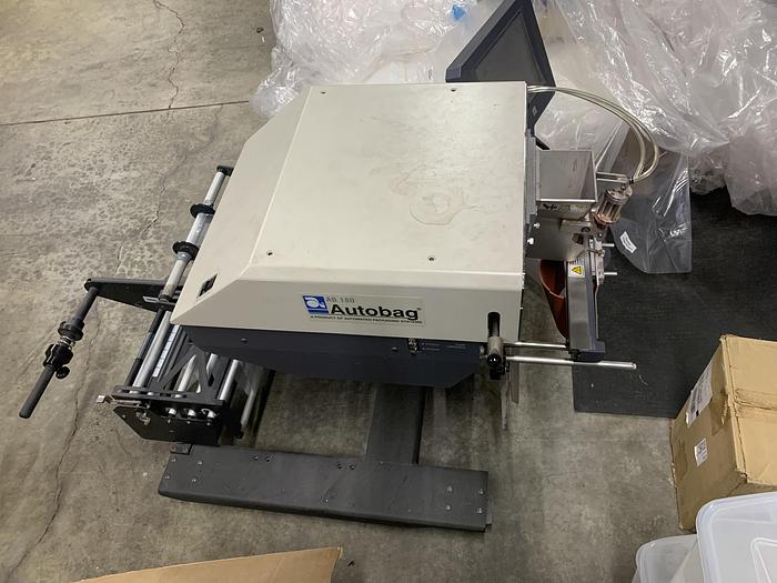 Used (2) MODEL AB-180 AUTO BAGGERS