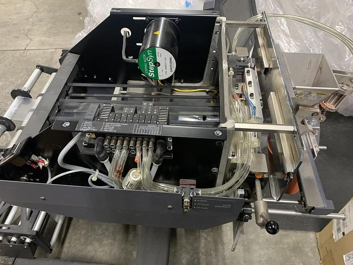 Used (2) MODEL AB-180 AUTO BAGGERS