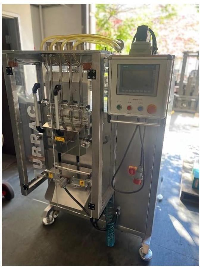 Used TURPACK 3 SIDE VERTICAL SEAL STICK PACK MACHINE - 4 LANE