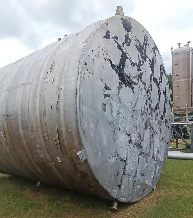 Used 12,000 GALLON ALLOY FAB VERTICAL MIX TANK WITH INTERNAL COILS - S/S