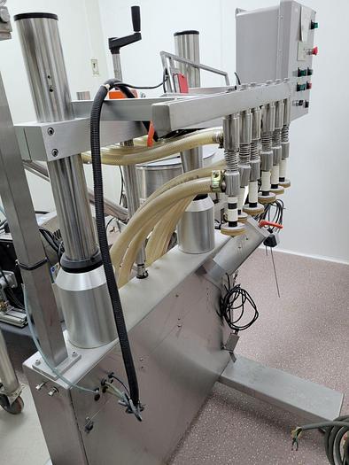 Used AESUS (DL TECH) 6 HEAD LIQUID FILLING LINE