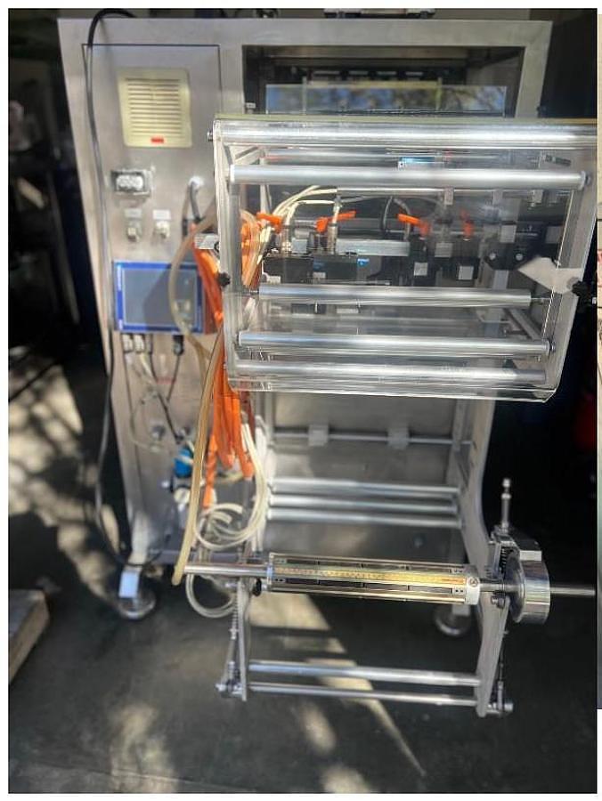 Used TURPACK 3 SIDE VERTICAL SEAL STICK PACK MACHINE - 4 LANE