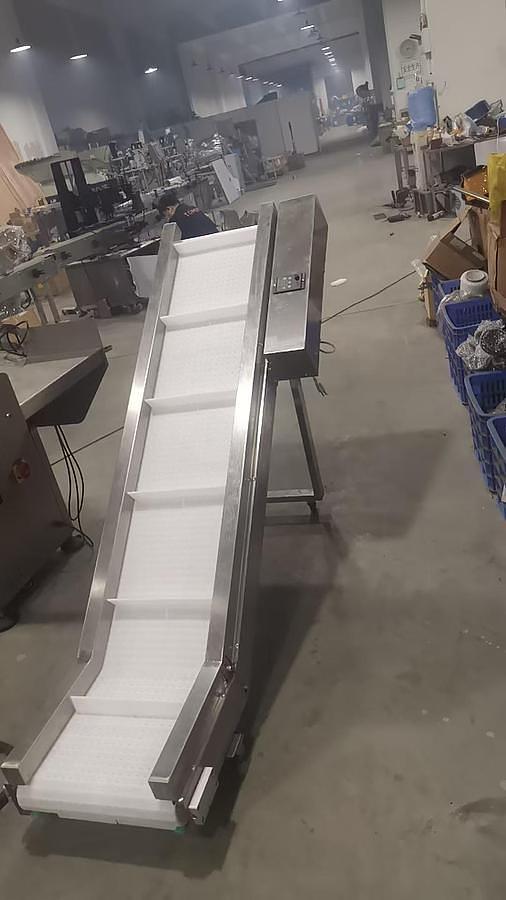 FINISHED PRODUCT CONVEYOR