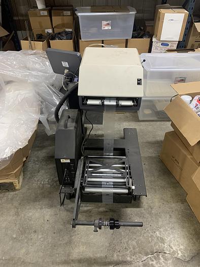 Used (2) MODEL AB-180 AUTO BAGGERS