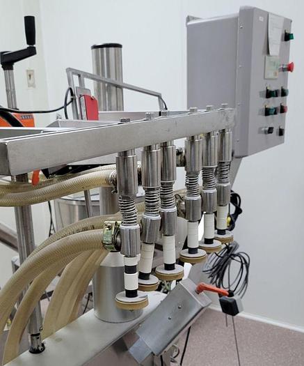 Used AESUS (DL TECH) 6 HEAD LIQUID FILLING LINE