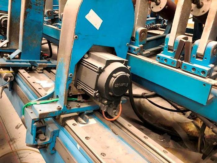 Used 141" DUSENBERY DUPLEX CENTER SURFACE SLITTER REWINDER