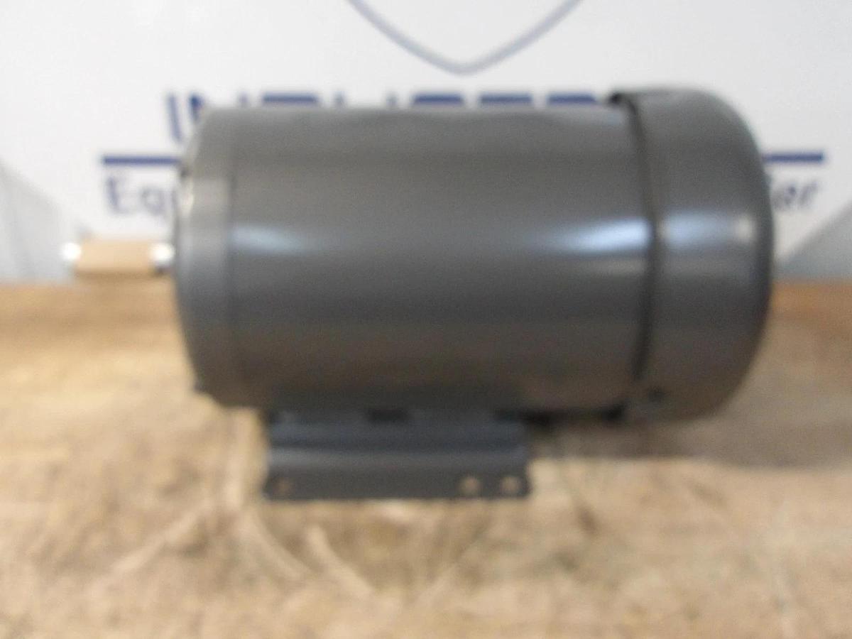Used BALDOR RELIANCE 3 HP MOTOR, 1750 RPM, 182T FR, 208-230/460 V, #691012G NEW